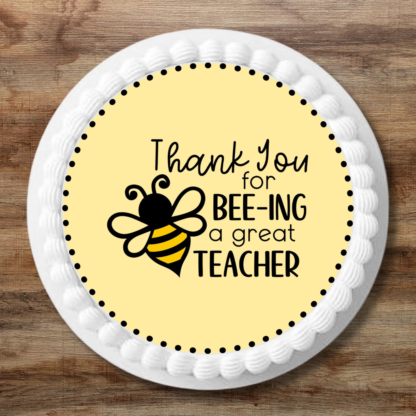 Thank You for bee-ing a great Teacher Edible Cupcake Topper with a cute bee design on a white frosted cake