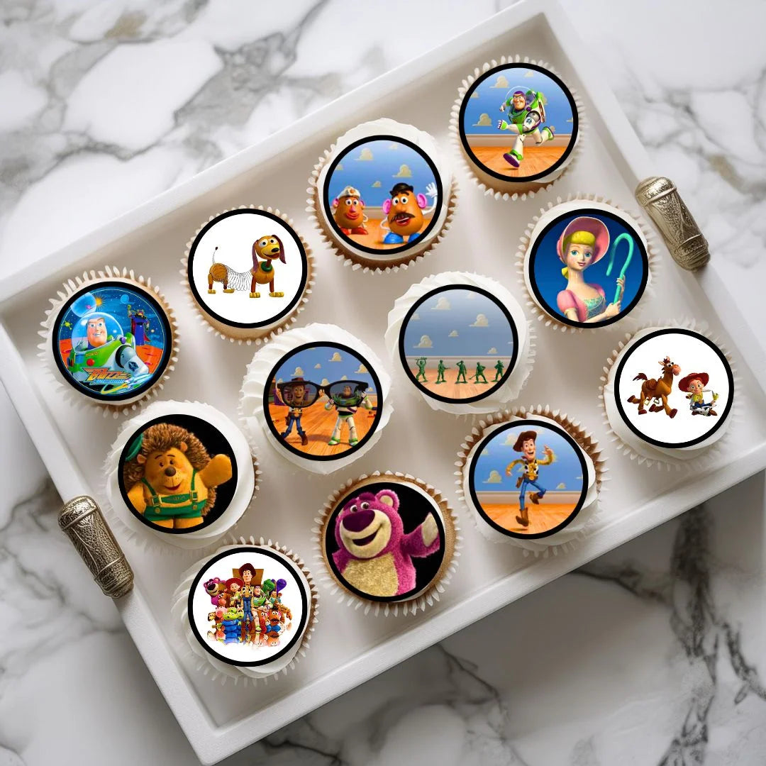 Toy Story 2 Edible Cupcake Toppers on white frosted cupcakes