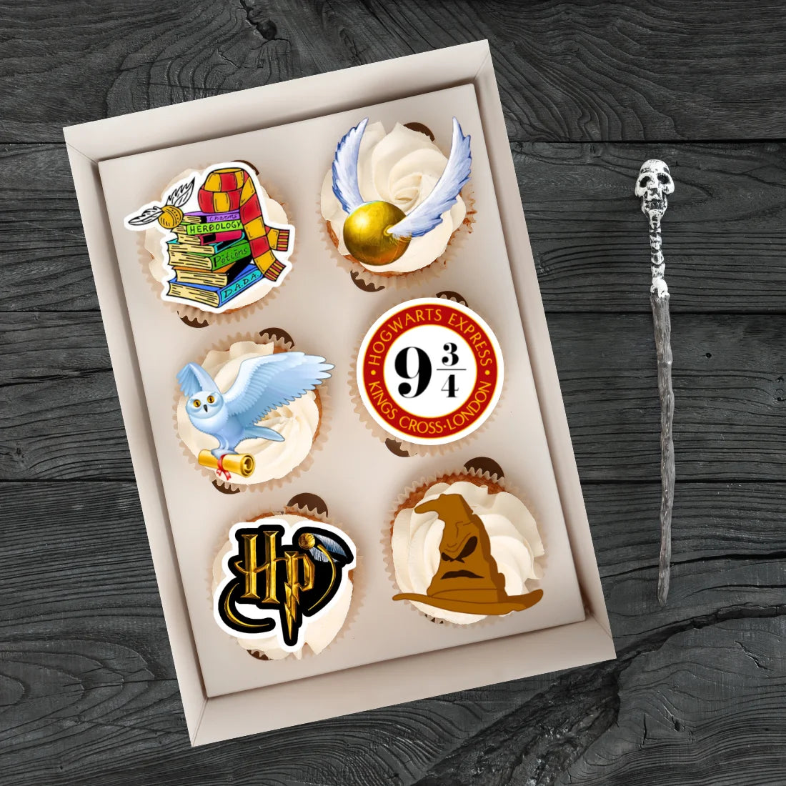 Wizard Theme Edible Cupcake Toppers on cupcakes with white frosting