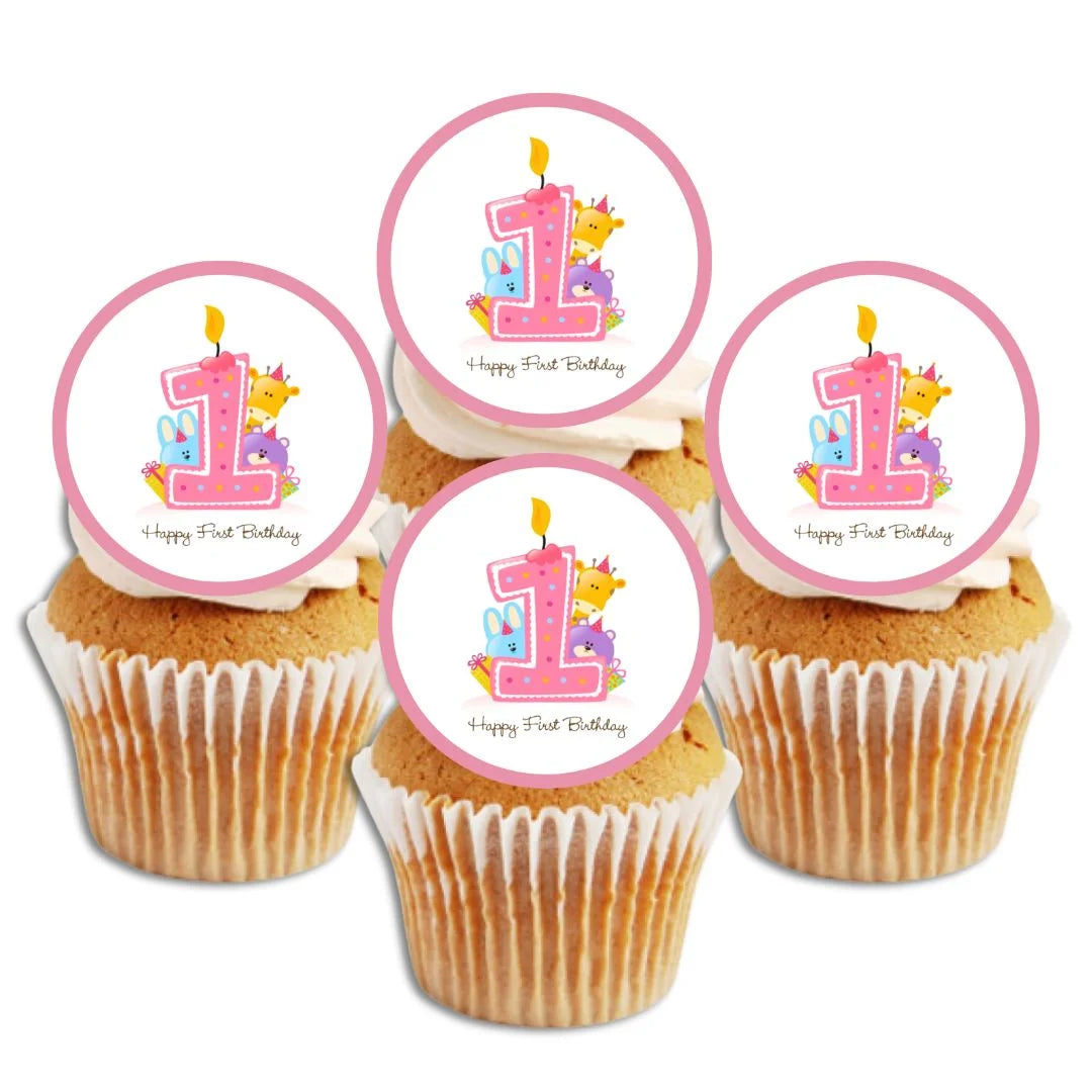 1st Birthday Pink Edible Cupcake Toppers with illustrated animals characters and a pink 1. The toppers are on white frosted cupcakes. 