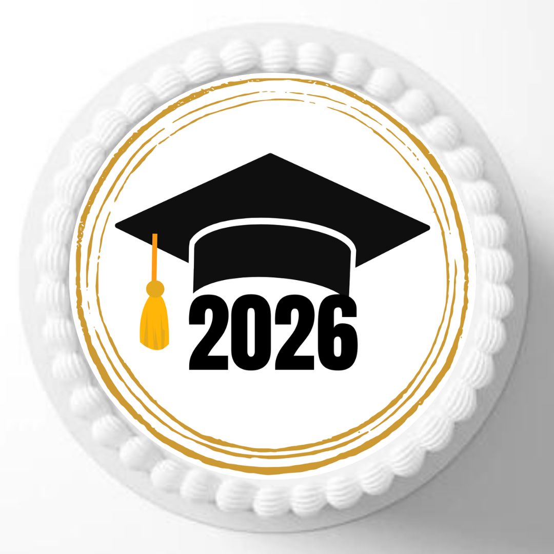 Graduation-themed cake with a black cap and yellow tassel on a white background
