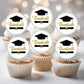 Cupcakes with 'Graduate' toppers on a blurred background