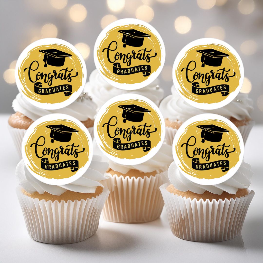Cupcakes with 'Congrats Graduates' toppers on a blurred background