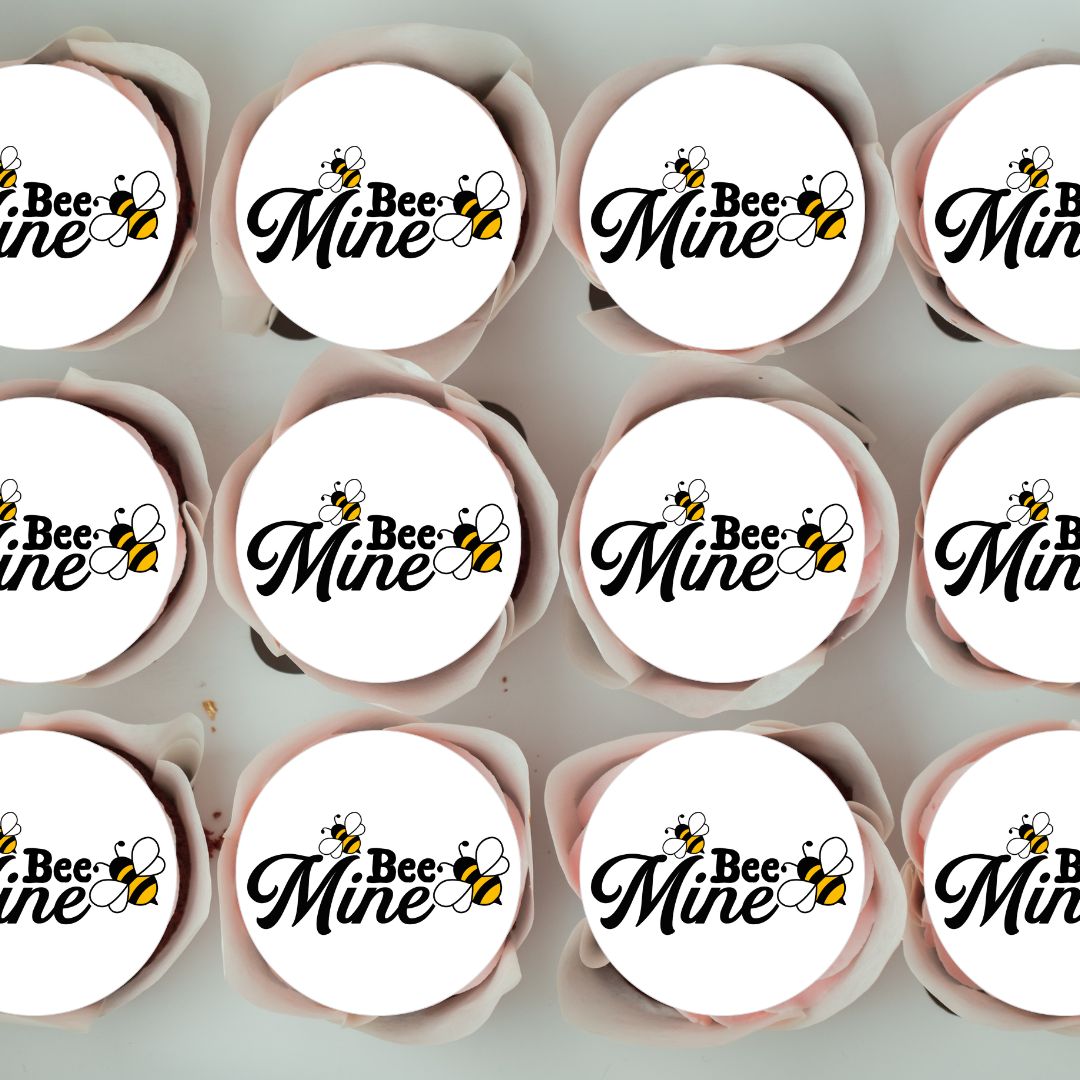 Cupcakes with 'Bee Mine' frosting in a box