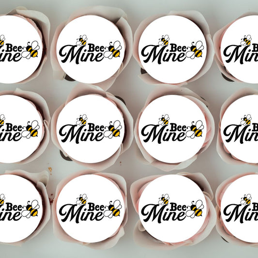 Cupcakes with 'Bee Mine' frosting in a box