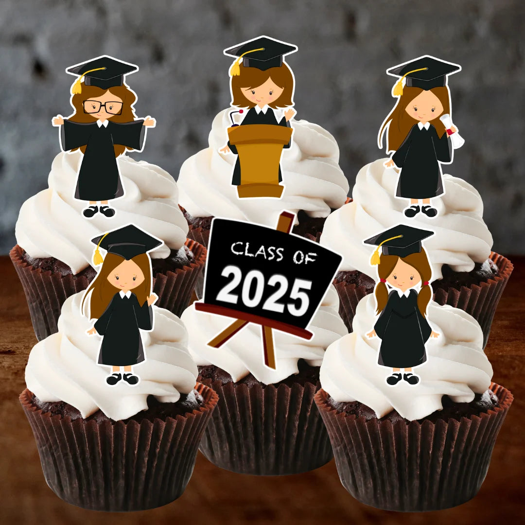 Graduation girls with black capes cupcake toppers on chocolate frosted cakes