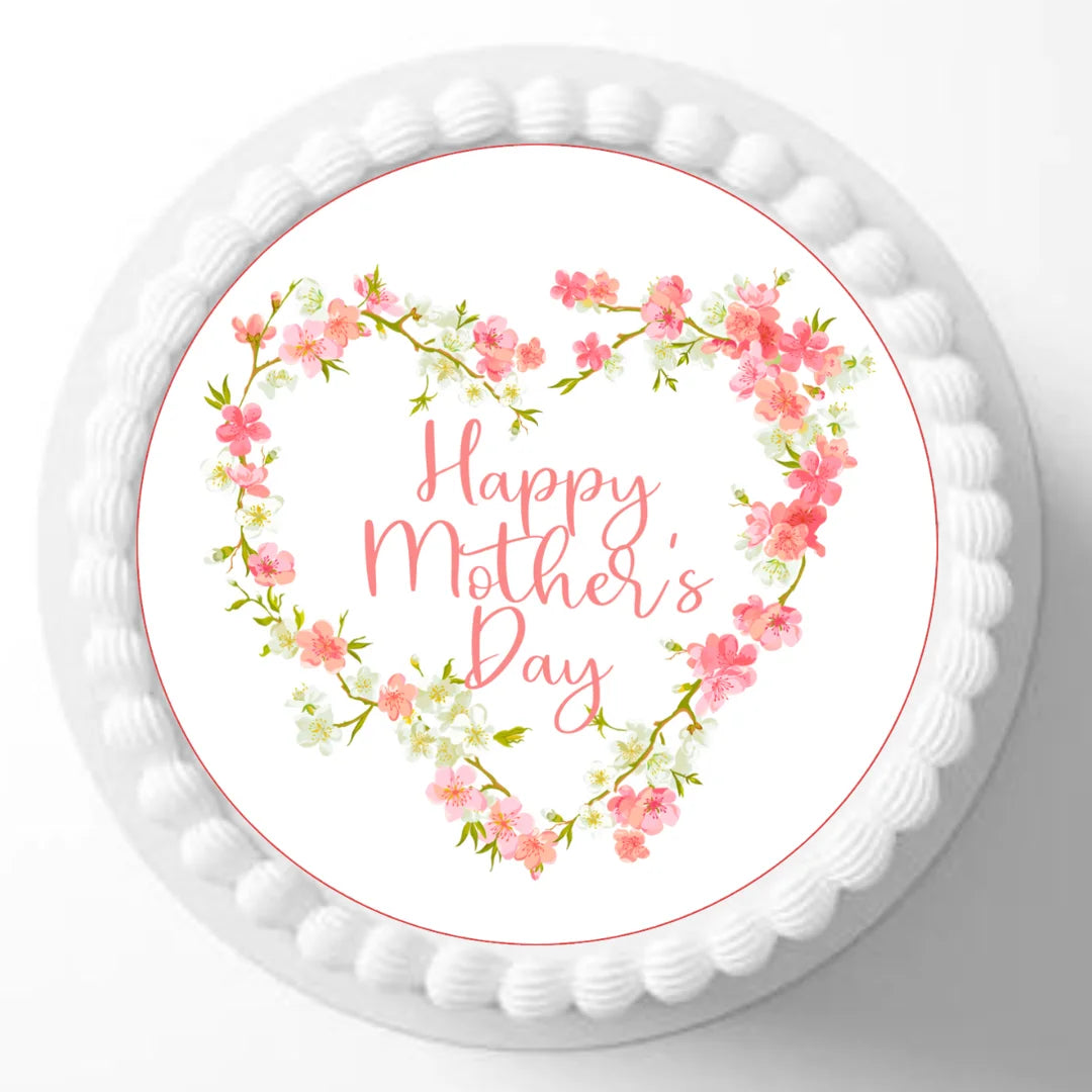 Pink Floral Mothers day cake topper placed on white frosted cake