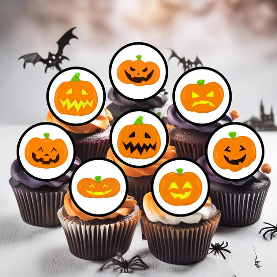 Orange pumpkin edible cupcake toppers on spooky frosted cupcakes