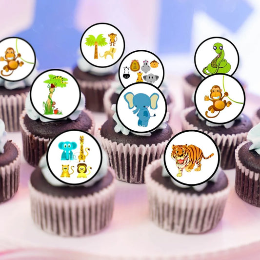 jungle themed edible cupcake toppers on chocolate cupcakes with with white frosting 