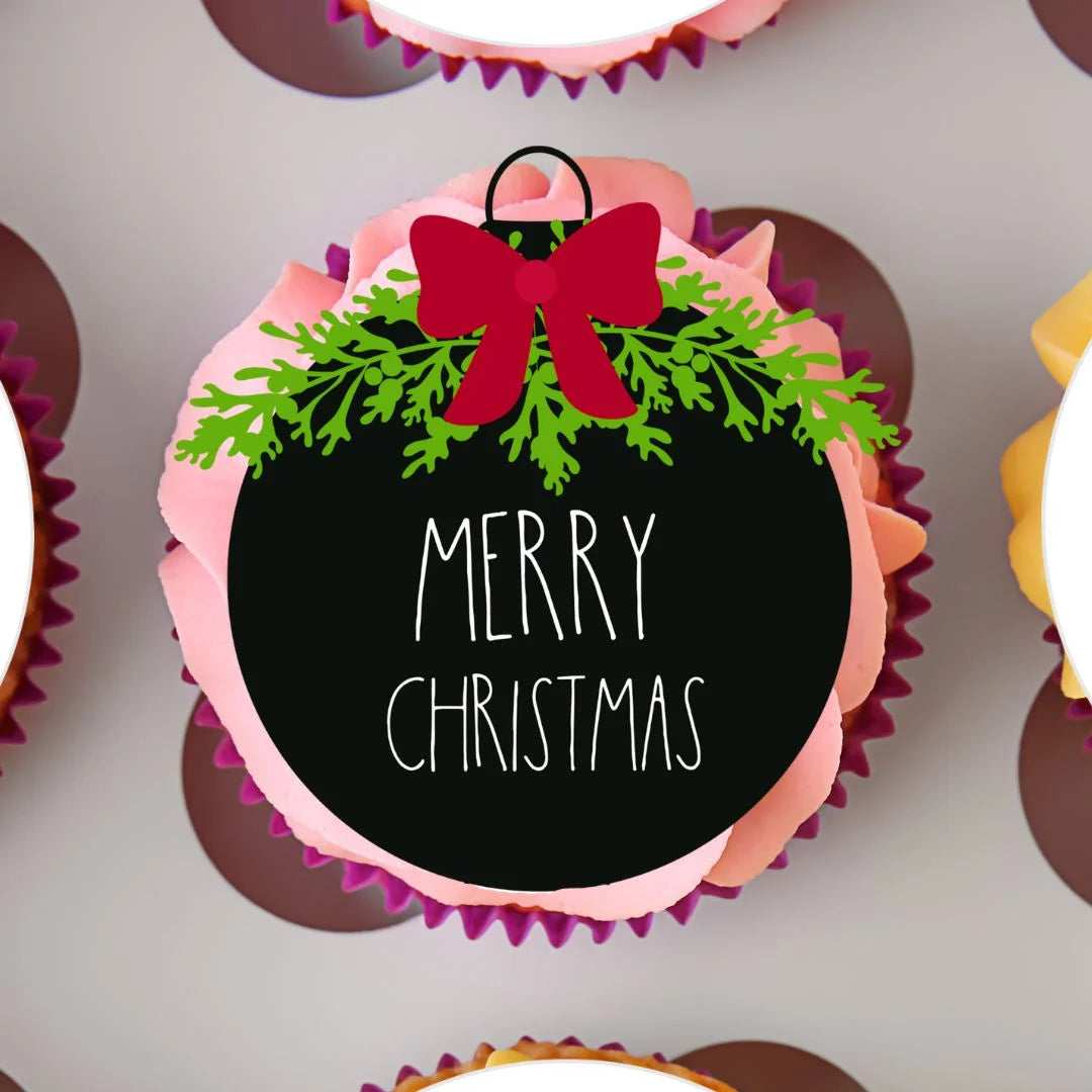 Merry Christmas Baubles Edible Cupcake Topper on a cupcake with pink frosting 