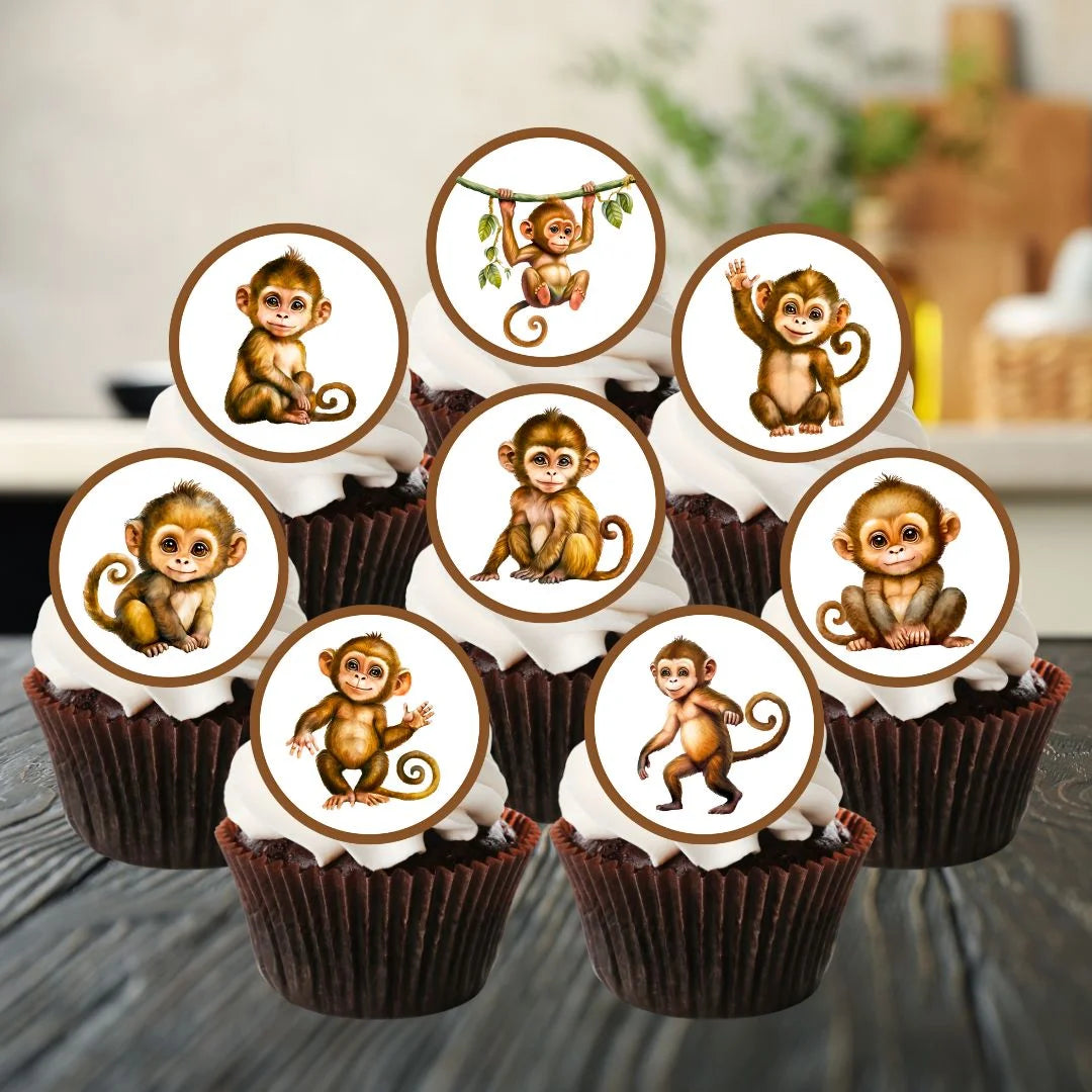 edible cupcake toppers featuring cartoon monkeys. The toppers are on chocolate cupcakes with white frosting