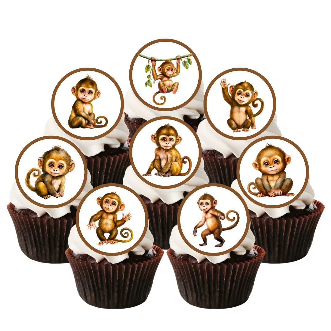 edible cupcake toppers featuring cartoon monkeys. The toppers are on chocolate cupcakes with white frosting