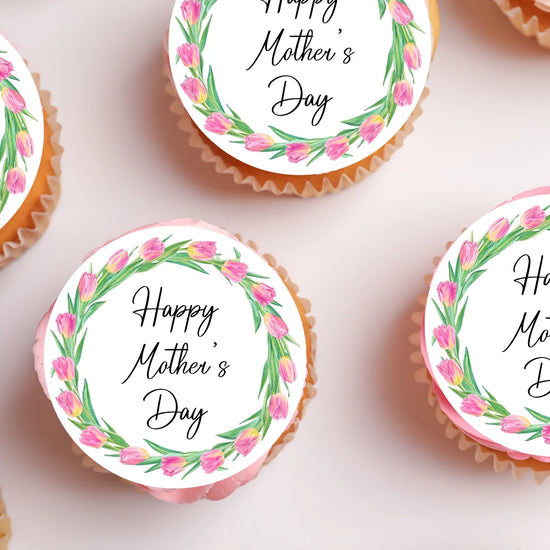 Spring tulip mothers day cupcake toppers, placed on pink frosted cupcakes
