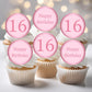 Pink 16th birthday cupcake toppers placed on white cupcakes