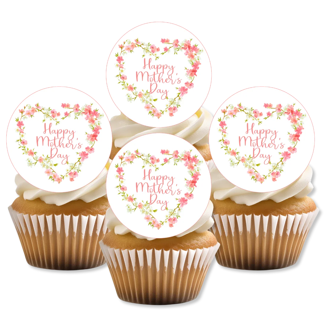 Pink Floral Mothers day cupcake toppers placed on white frosted cupcakes