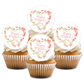 Pink Floral Mothers day cupcake toppers placed on white frosted cupcakes