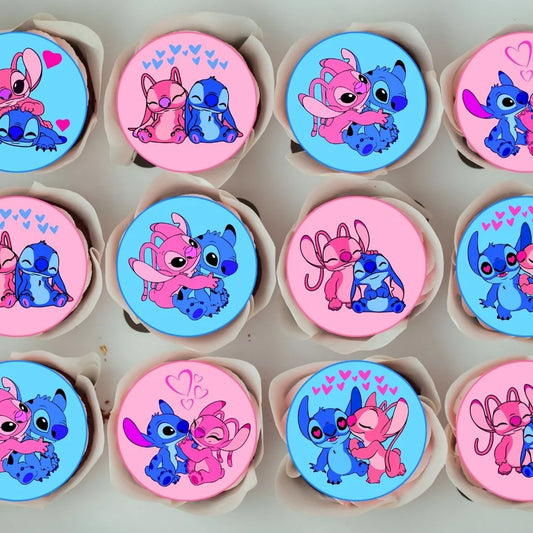 Blue and pink stitch & angel cupcake toppers, in a cake box