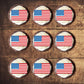 top view of American Flag Edible Cupcake Toppers on nine frosted cupcakes  