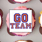 American Football Blue + Orange Edible Cupcake Toppers on a pink frosted cupcake