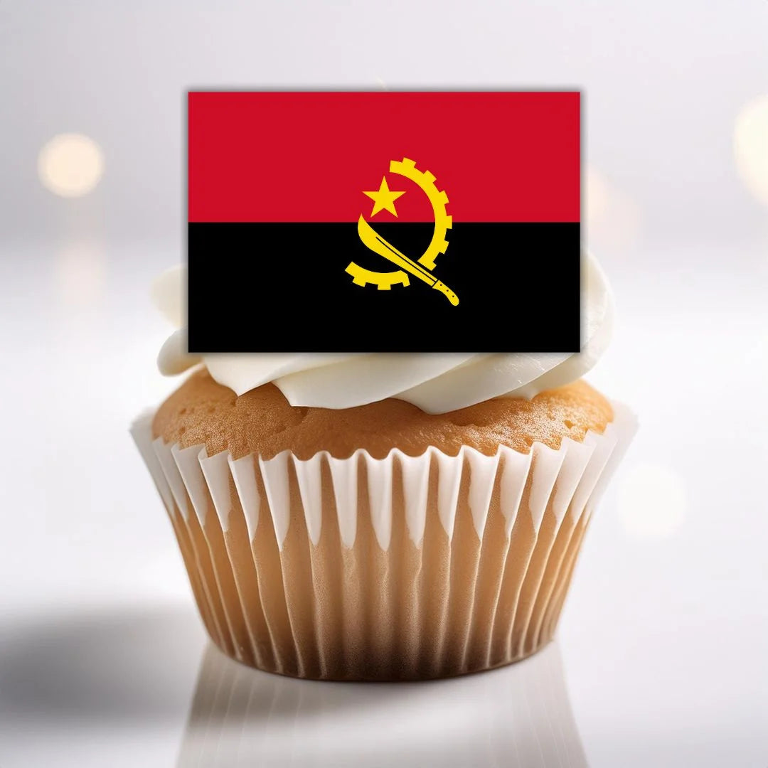 close up of angola  Flag Edible Cupcake Toppers on sponge cupcakes with white frosting 