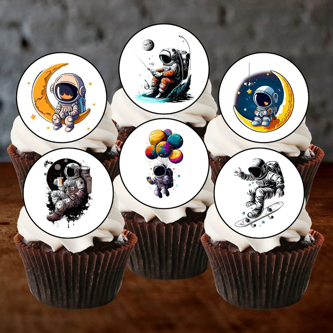 Astronaut Edible Cupcake Toppers on chocolate cupcakes with white frosting 
