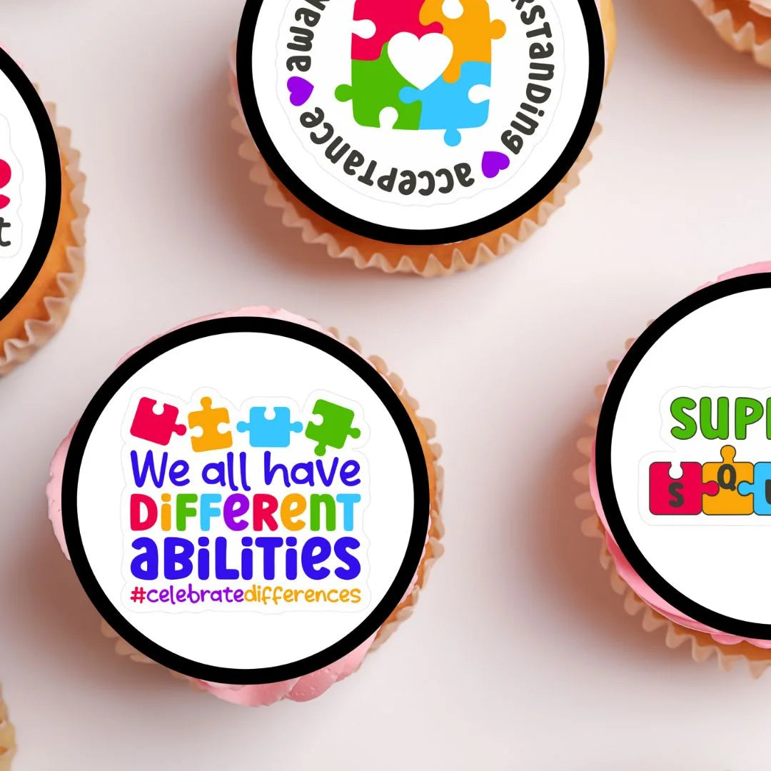 Autism Awareness Edible Cupcake Toppers on cupcakes with pink 
frosting 