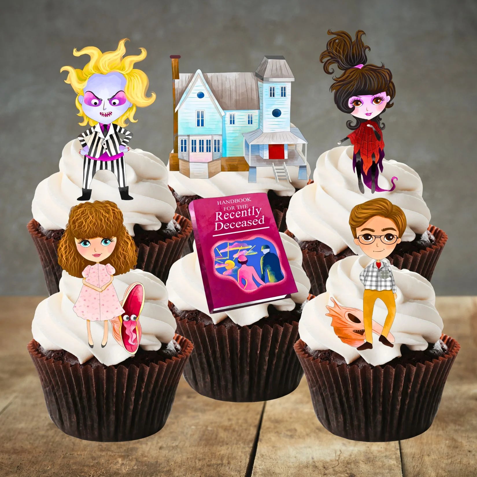 Beetlejuice Theme Edible Cupcake Toppers on chocolate cupcakes with white frosting 