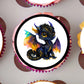 close up of a cute black dragon cake topper on a frosted cupcake 