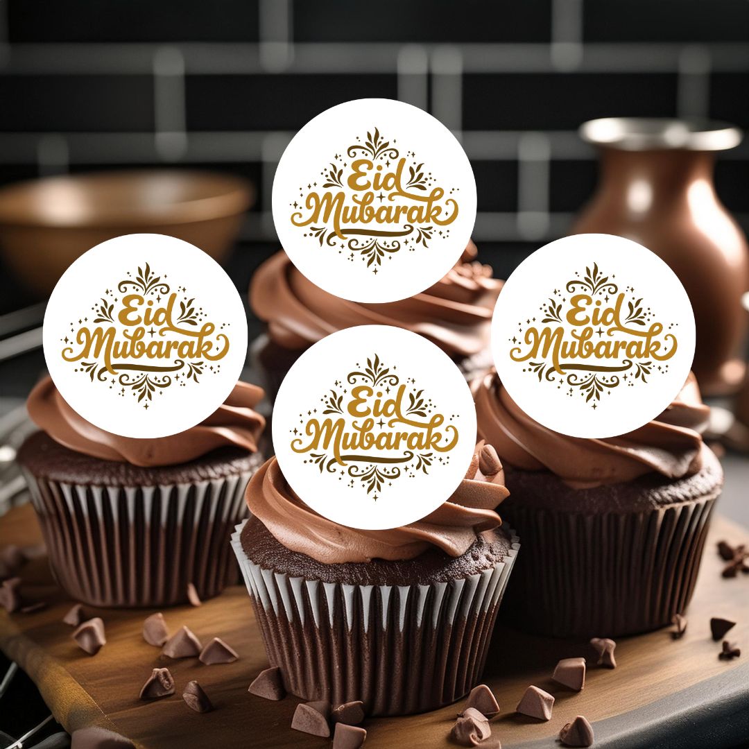 Chocolate cupcakes with 'Eid Mubarak' toppers on a wooden board.