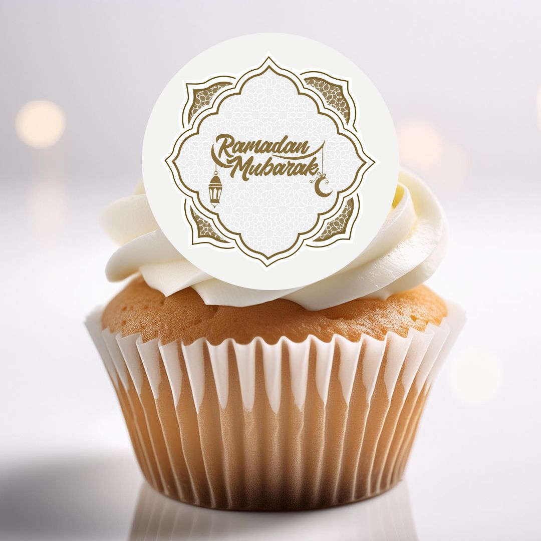 Cupcake with 'Ramadan Mubarak' topper on a light background