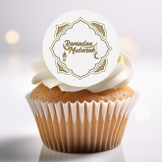 Cupcake with 'Ramadan Mubarak' topper on a light background