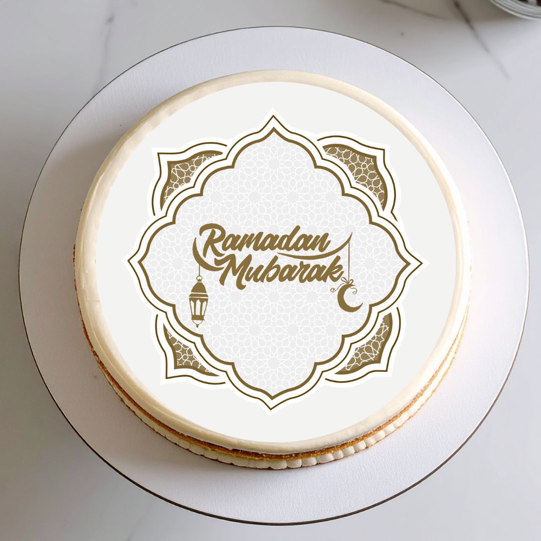 Cheesecake with 'Ramadan Mubarak' text on a white plate