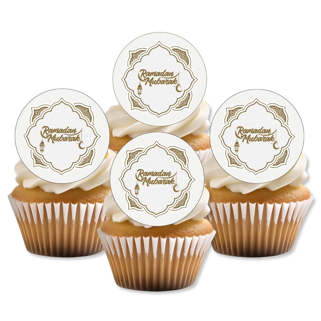 Cupcakes with 'Ramadan Mubarak' toppers on a white background