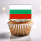 close up of Bulgaria Flag Edible Cupcake Topper on a white frosted cupcake