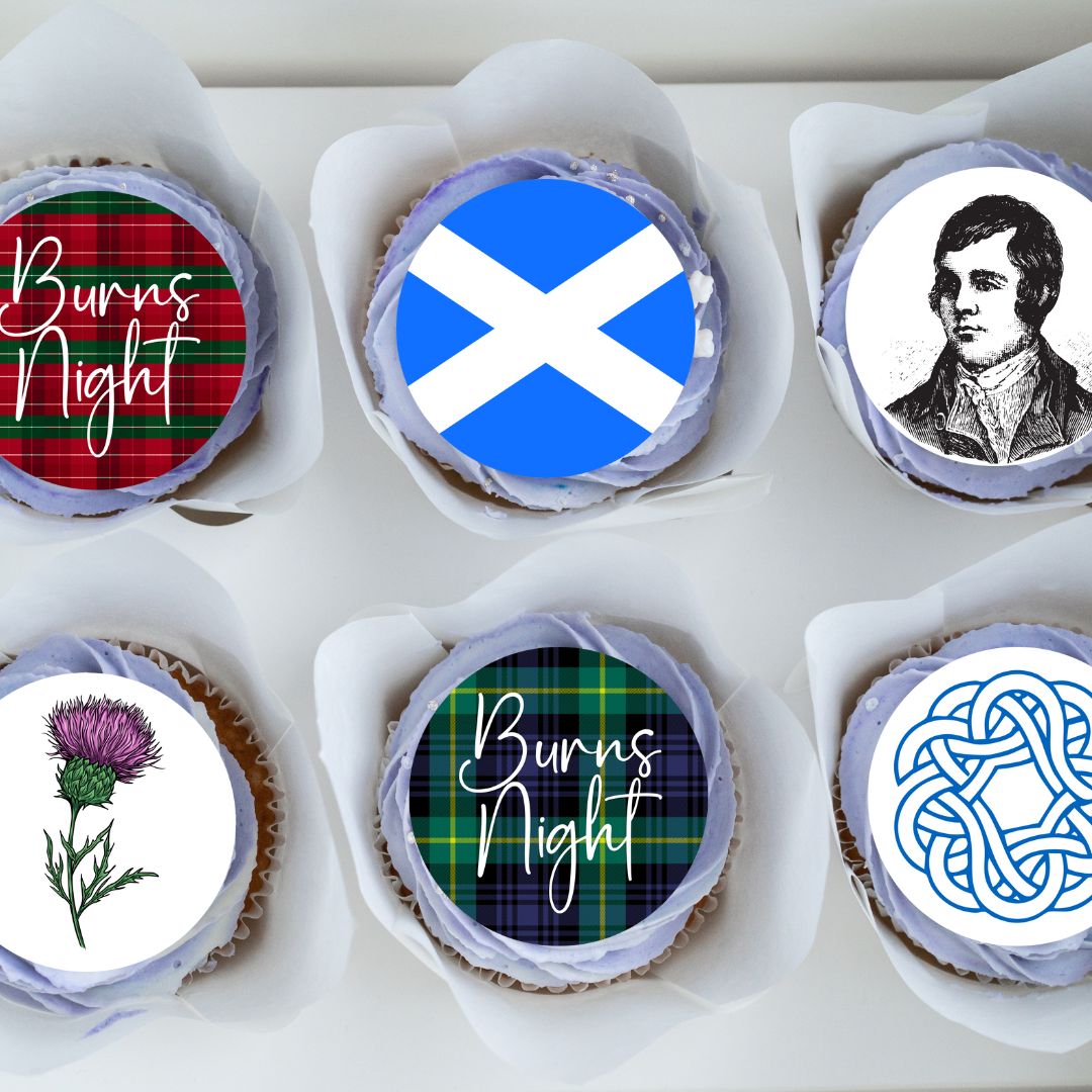 Cupcakes decorated with Scottish-themed designs including a flag, tartan pattern, thistle, and Celtic knot.