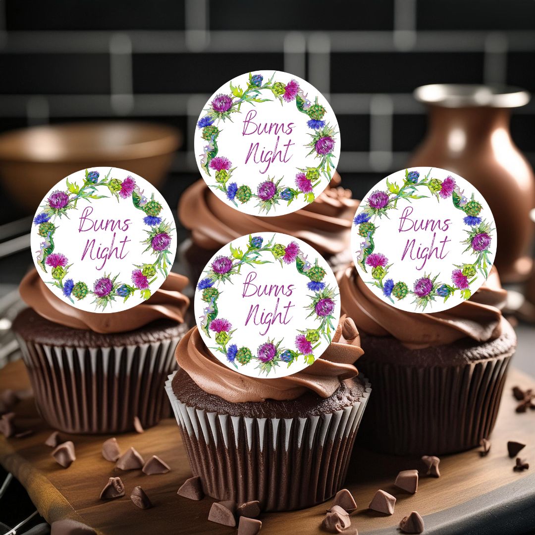 Chocolate cupcakes with floral 'Buns Night' toppers on a wooden board.