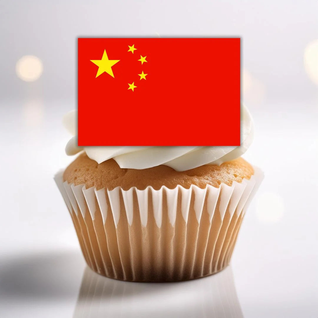 close up of China Flag Edible Cupcake Topper on a white frosted cupcake