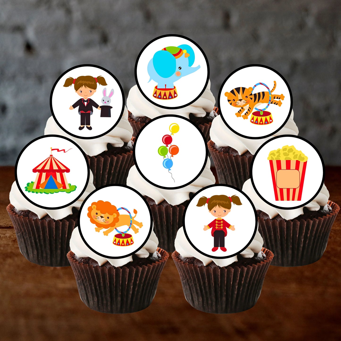 Circus Theme Edible Cupcake Toppers on cupcakes with white frosting