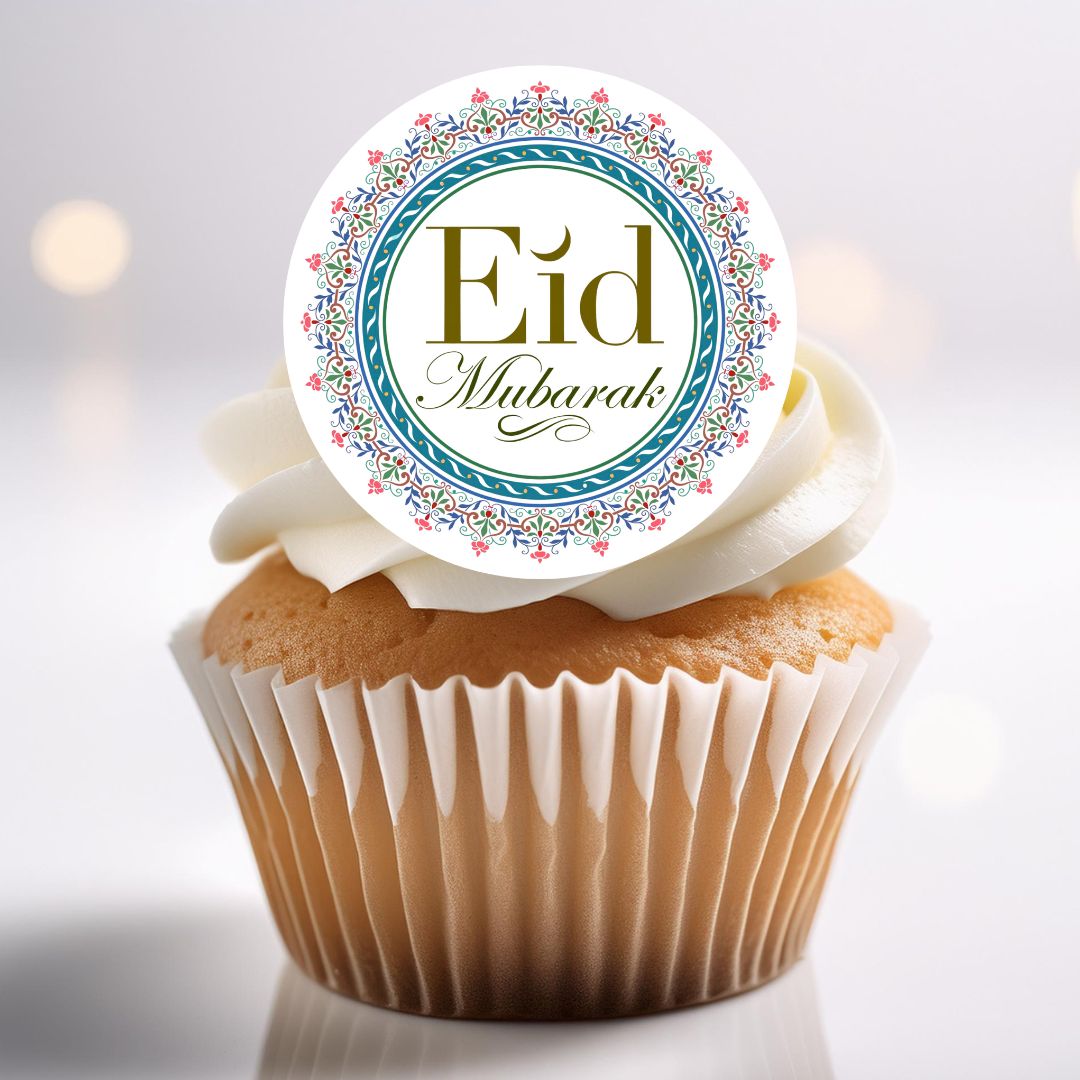 Cupcake with an 'Eid Mubarak' topper on a white background