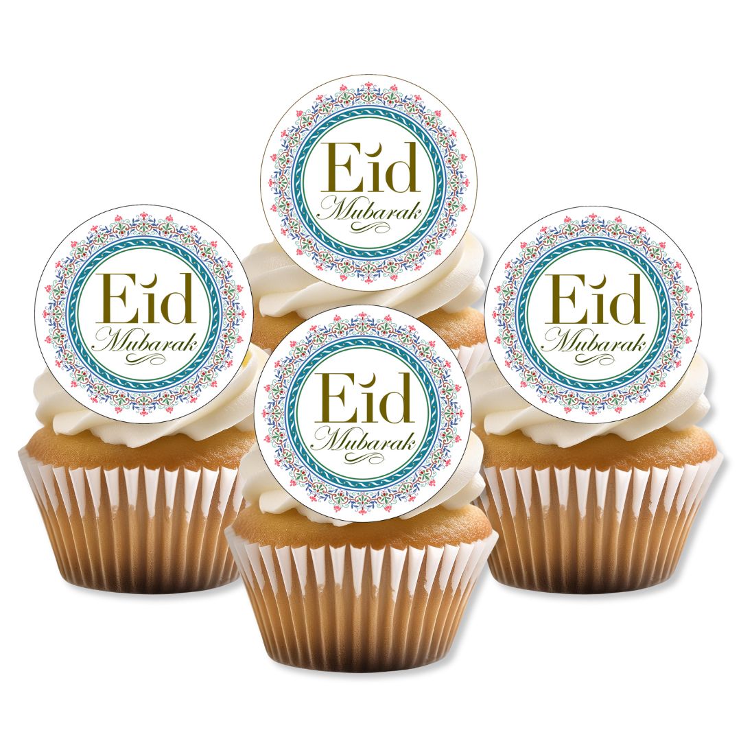 Cupcakes with 'Eid Mubarak' toppers on a white background