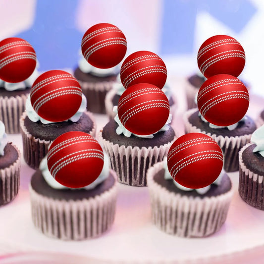 Cricket Ball Edible Cupcake Toppers on chocolate frosted cupcakes