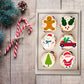 Cute Christmas Cupcake Toppers on white frosted cupcakes 