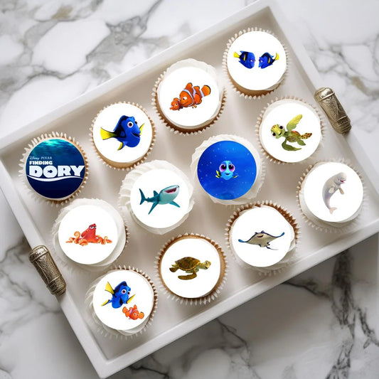 Finding Dory Edible Cupcake Toppers on chocolate cupcakes with white frosting 