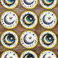 Decorative plates with moon and star designs on a wooden surface
