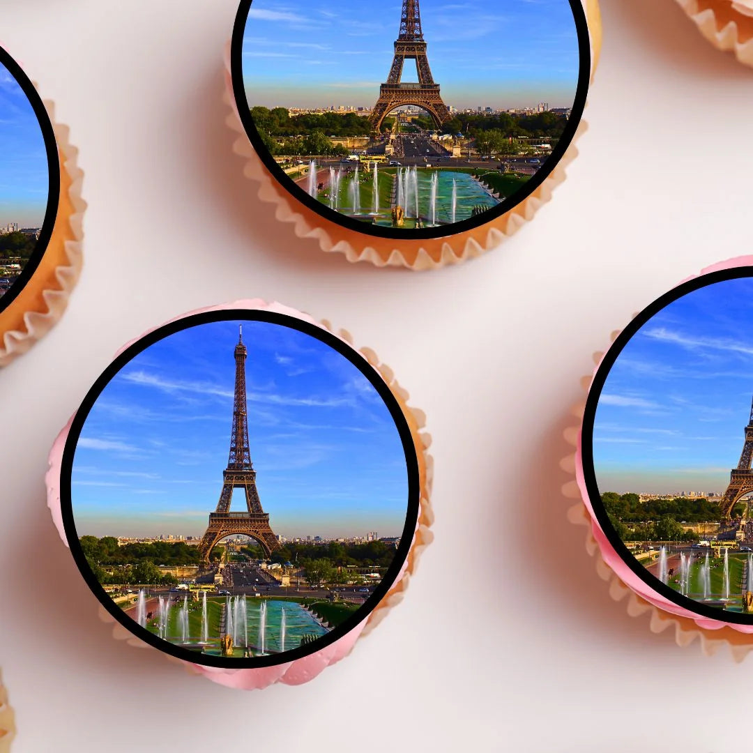 Eiffel Tower Edible Cupcake Toppers on white frosted cupcakes 