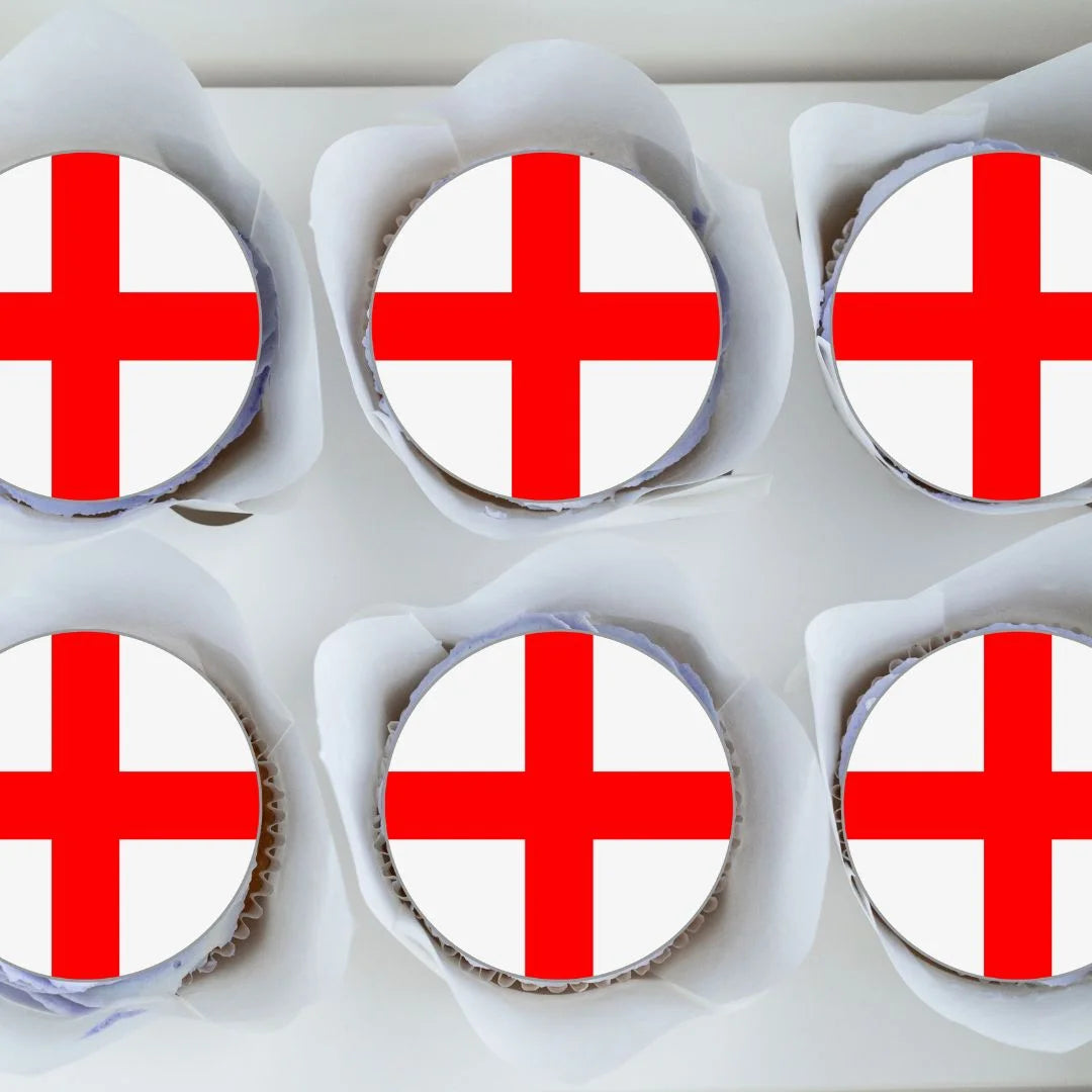 top view of six England Flag Round Edible Cupcake Toppers on cupcakes 