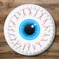 Halloween Eyeballs Edible Cupcake Toppers on a large cake with white frosting 