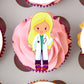 close up of anEdible Cupcake Topper shaped like a female doctor on a pink frosted cupcake