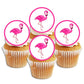 white frosted cupcakes with bright pink flamingo edible cake toppers 