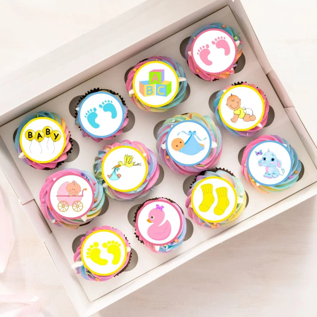 tray of rainbow cupcakes with Neutral Baby Shower Edible Cupcake Toppers